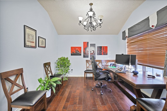 office space featuring a textured ceiling, dark hardwood / wood-style flooring, vaulted ceiling, and a notable chandelier