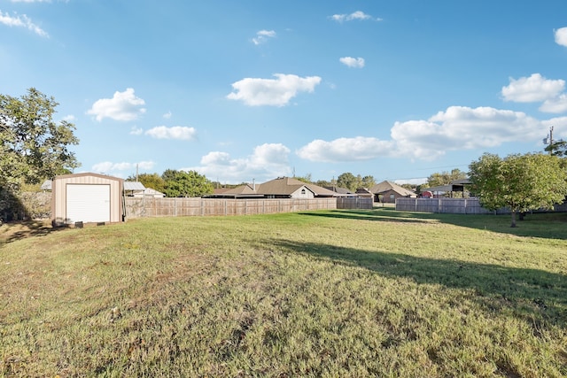 view of yard featuring a storage unit