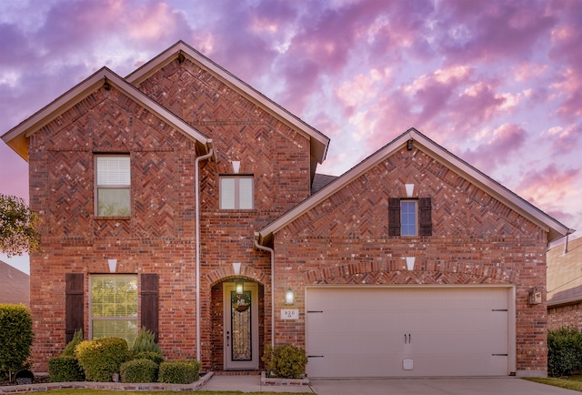 front of property with a garage