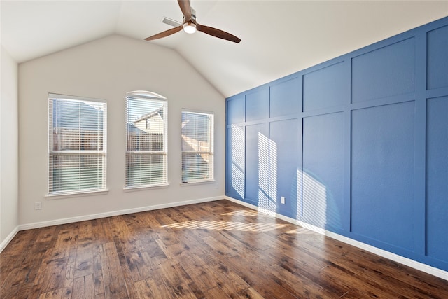 interior space featuring lofted ceiling, ceiling fan, and dark hardwood / wood-style floors