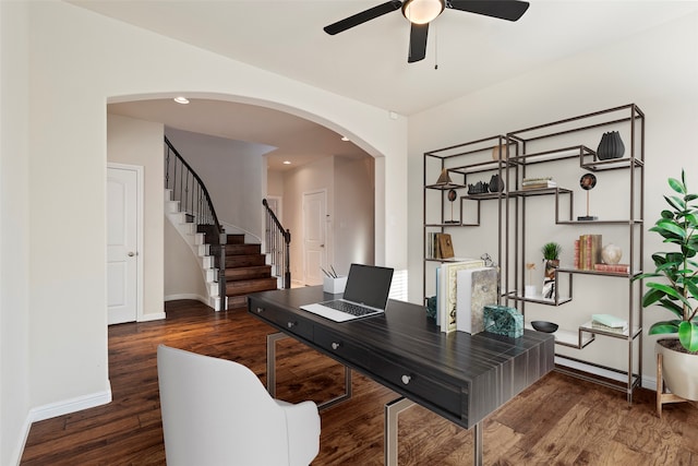 office space featuring ceiling fan and dark hardwood / wood-style floors