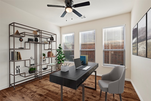 office space featuring ceiling fan and dark hardwood / wood-style floors