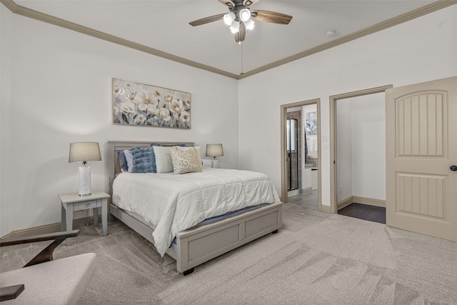 carpeted bedroom featuring ceiling fan and crown molding