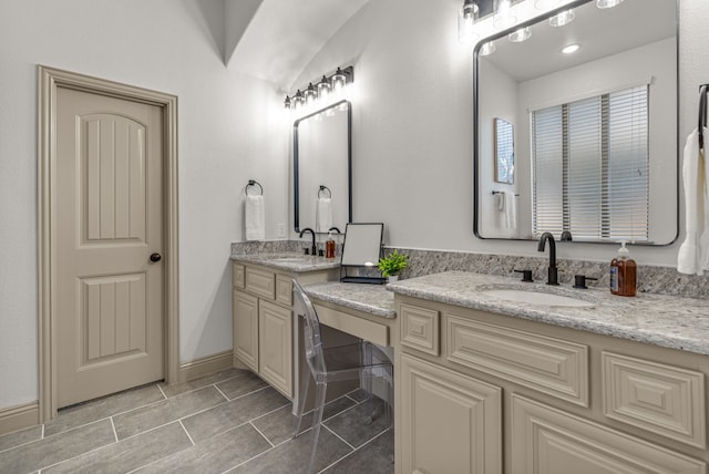 bathroom with vanity and tile patterned floors