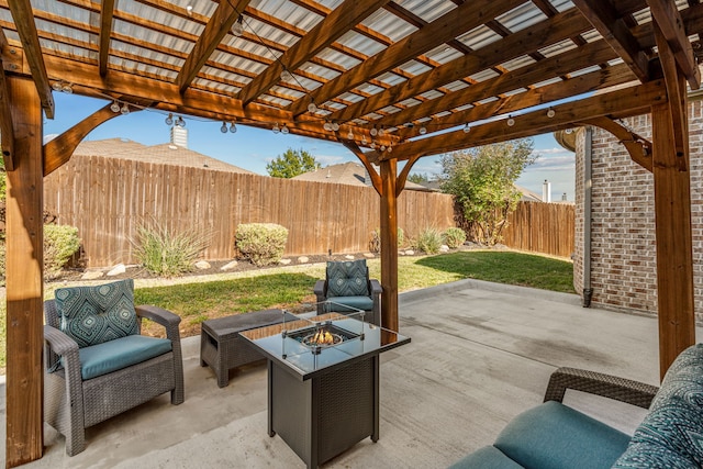 view of patio / terrace with a fire pit