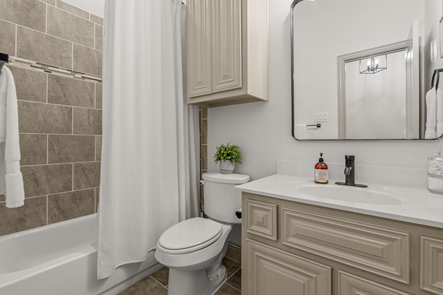 full bathroom featuring tile patterned floors, vanity, shower / bath combination with curtain, and toilet