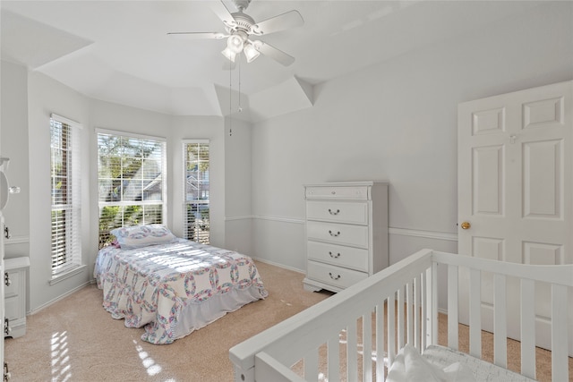 bedroom featuring ceiling fan and light colored carpet