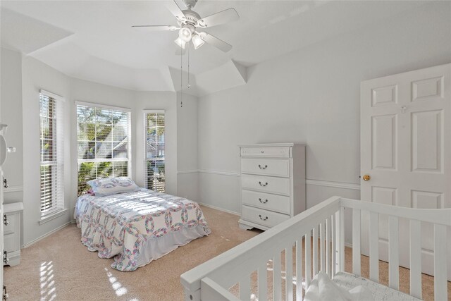 bedroom featuring ceiling fan and light colored carpet