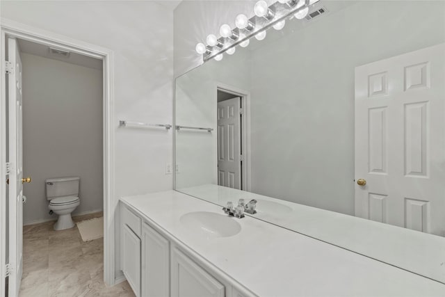 1431 Murphy Dr, Rockwall, TX 75087 - bathroom with toilet and vanity