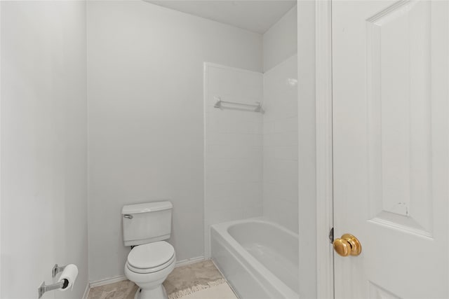 bathroom with tile patterned flooring, toilet, and tub / shower combination