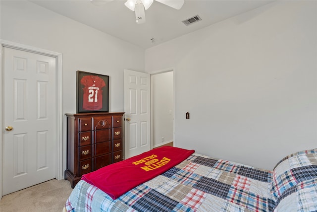 carpeted bedroom featuring ceiling fan