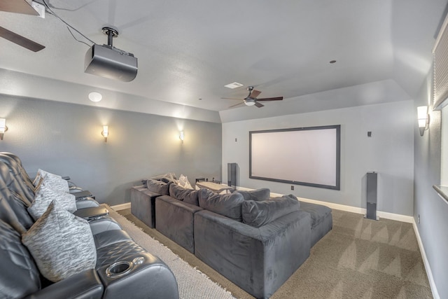 cinema with ceiling fan and carpet floors