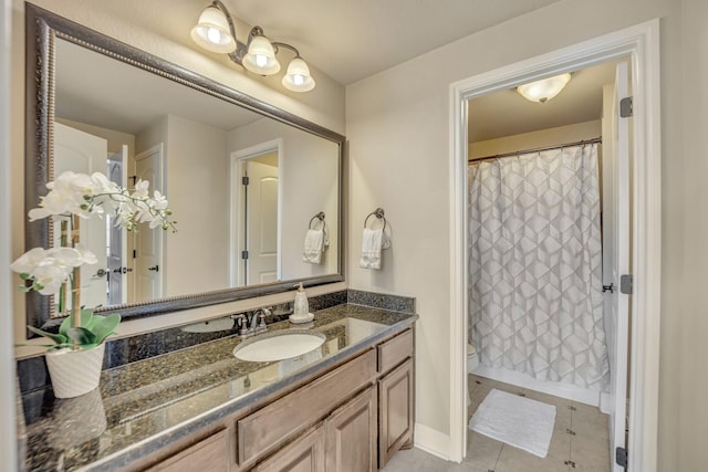 bathroom featuring tile patterned floors, vanity, toilet, and a shower with shower curtain