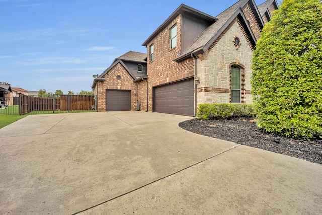 view of front of home with a garage