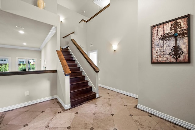 stairs with crown molding