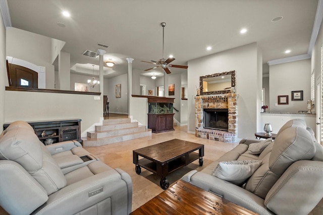 living room featuring ceiling fan with notable chandelier