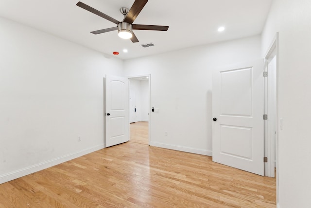 unfurnished bedroom featuring light hardwood / wood-style floors and ceiling fan