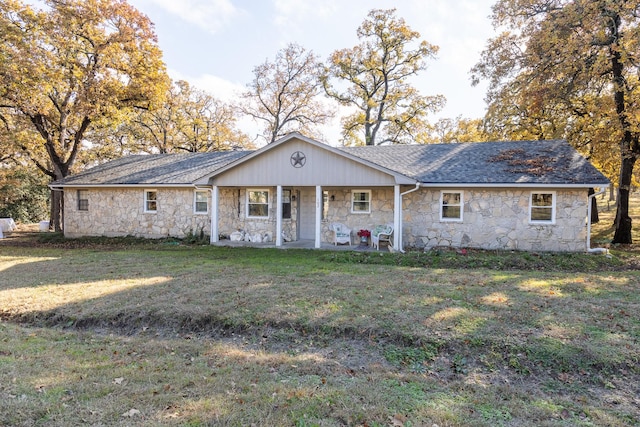 ranch-style home with a front yard