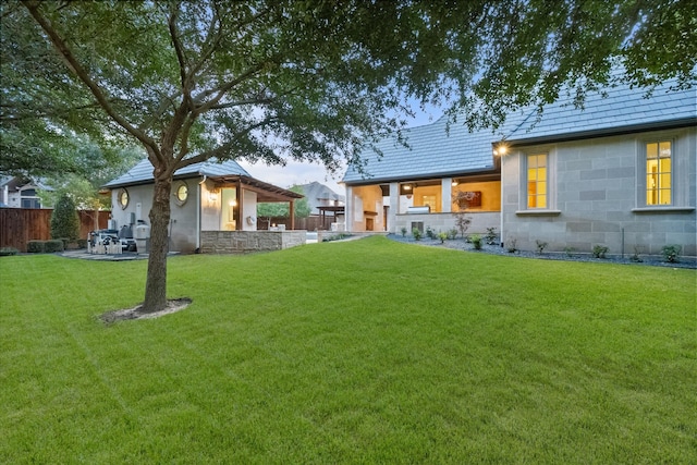 view of yard featuring a patio and fence