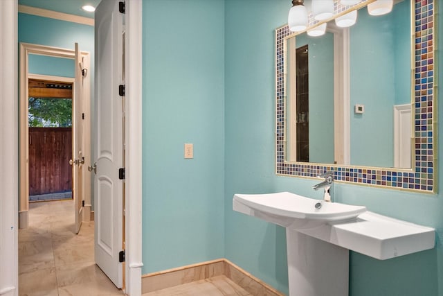 bathroom featuring marble finish floor