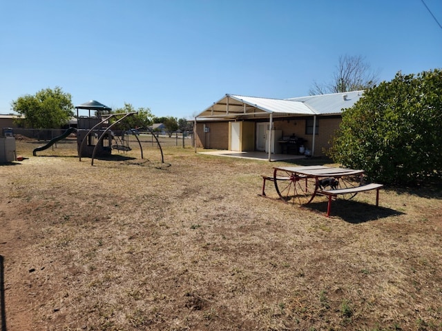 view of yard featuring a playground