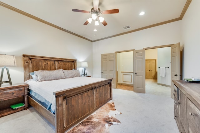 bedroom featuring ceiling fan, crown molding, and light colored carpet