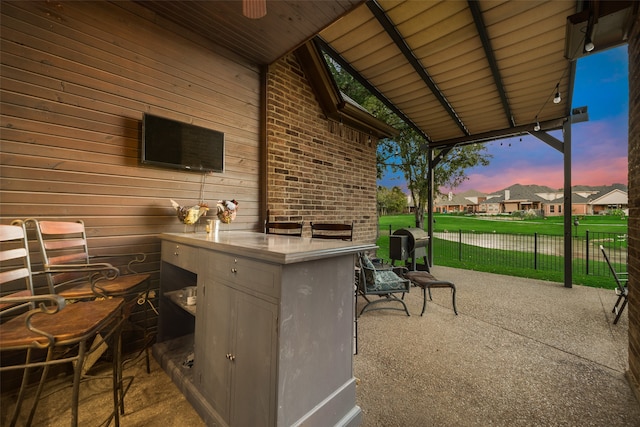 view of patio featuring exterior bar