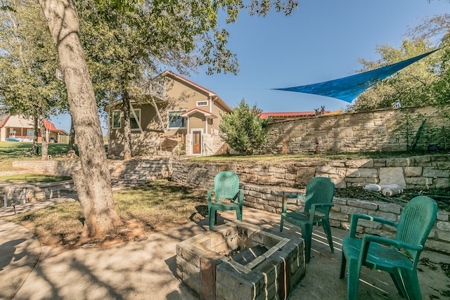 view of community with a patio