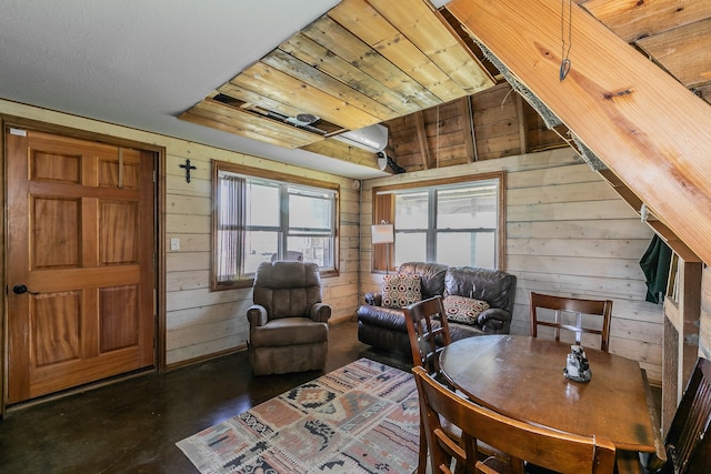 living room featuring wooden walls