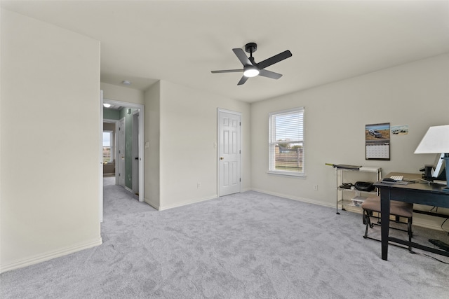 office featuring ceiling fan and light colored carpet