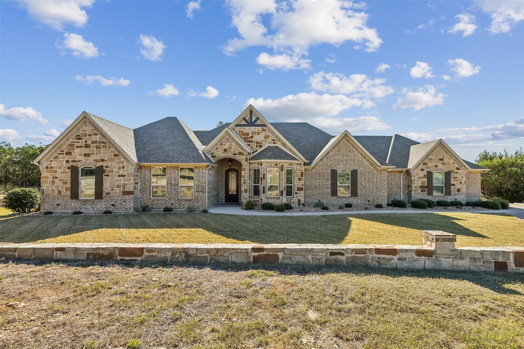 view of front of home with a front yard