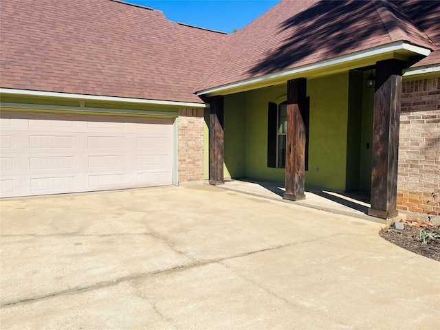 view of side of property with a garage