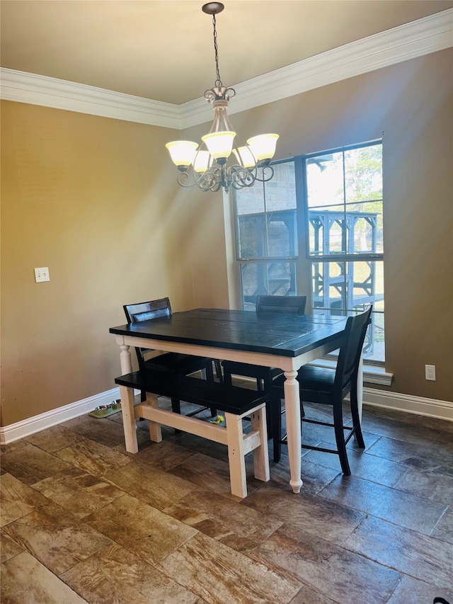 dining area featuring a notable chandelier and ornamental molding