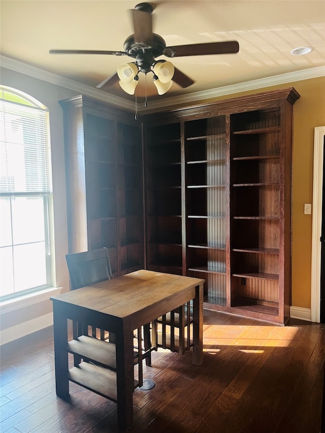 dining room with hardwood / wood-style floors, ceiling fan, and ornamental molding