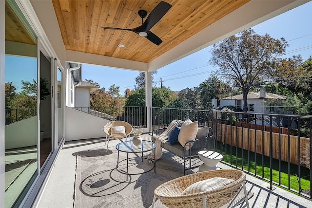 balcony featuring ceiling fan