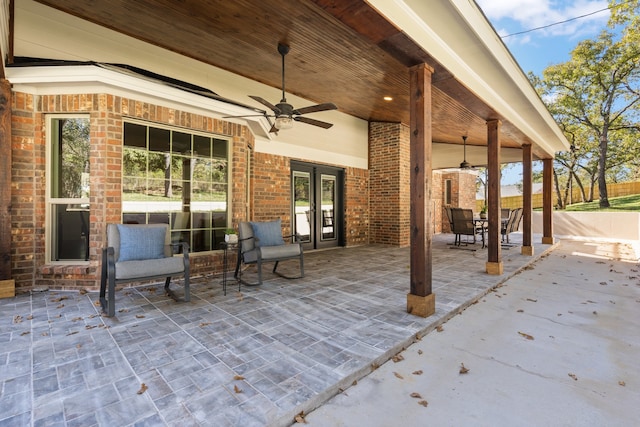 view of patio / terrace featuring ceiling fan