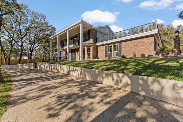 view of front of home with a front yard