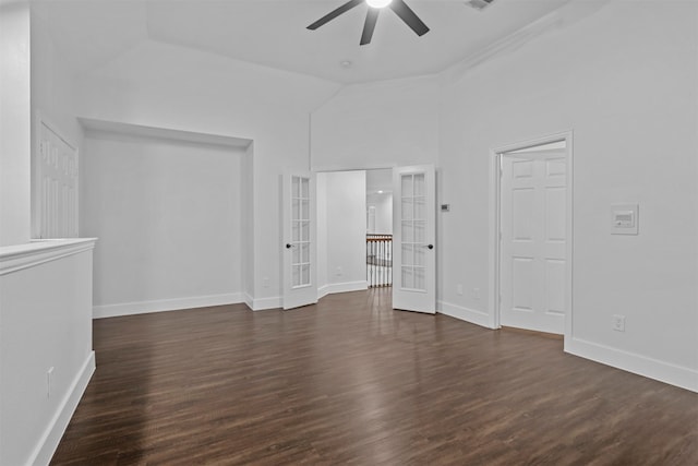 unfurnished living room with french doors, high vaulted ceiling, ceiling fan, and dark wood-type flooring