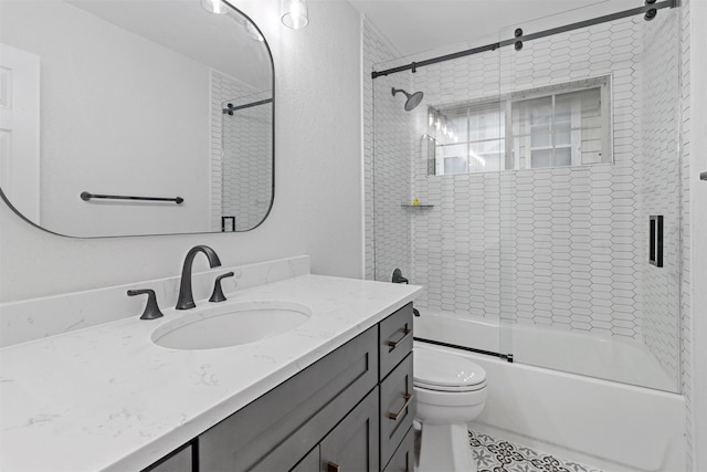 full bathroom with shower / bath combination with glass door, vanity, and toilet