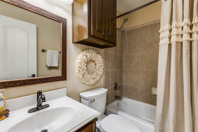 full bathroom featuring vanity, shower / bath combo, and toilet