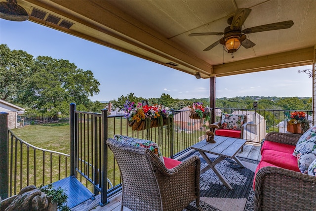 exterior space with ceiling fan