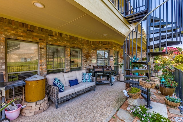 view of patio / terrace with an outdoor hangout area and grilling area