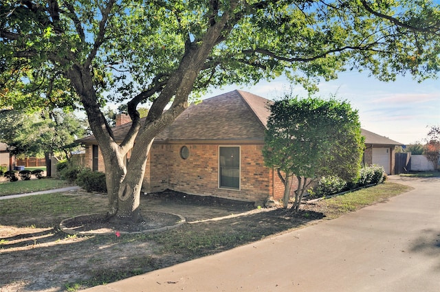 view of front of property with a garage