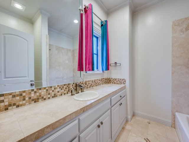 bathroom with vanity, ornamental molding, a tub, and tasteful backsplash