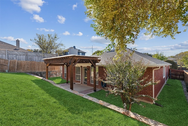 back of property with a pergola, a patio area, and a lawn