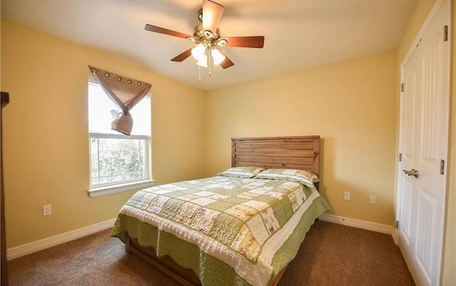 bedroom with ceiling fan and carpet floors