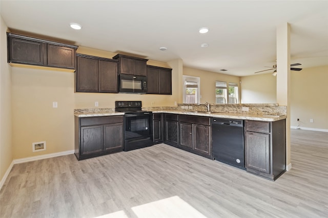 kitchen featuring black appliances, sink, light hardwood / wood-style flooring, ceiling fan, and dark brown cabinets