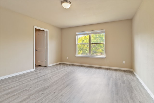 empty room featuring light hardwood / wood-style floors