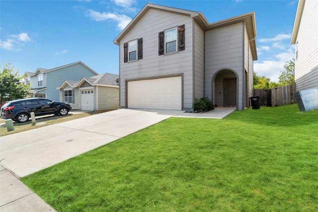 front of property with a front yard and a garage