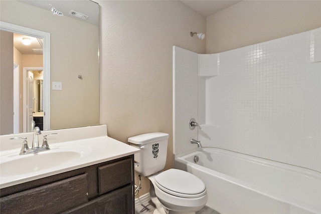 full bathroom featuring vanity, shower / bath combination, and toilet